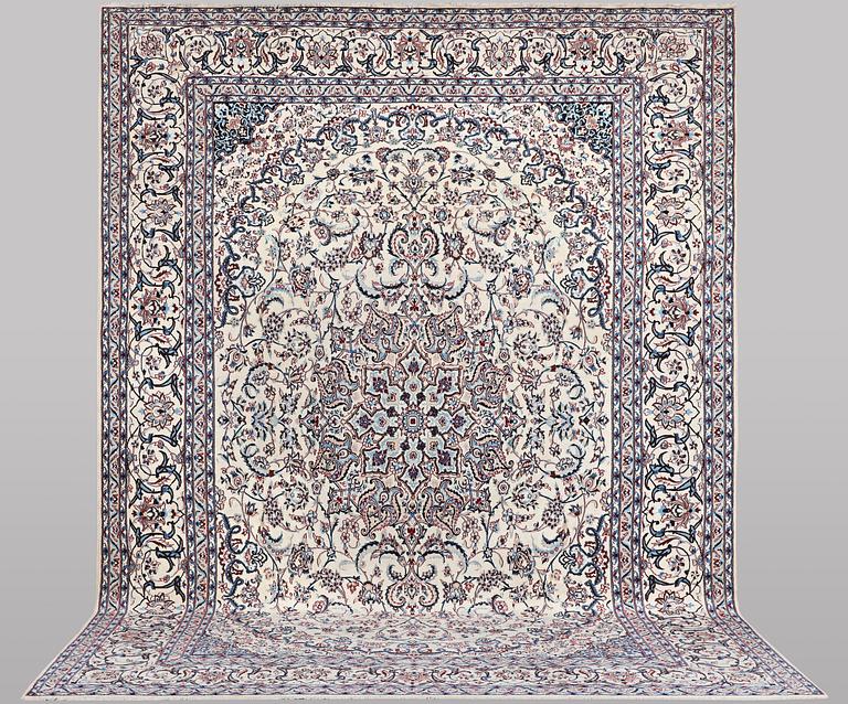 A carpet, Nain, part silk, ca 426 x 309 cm.