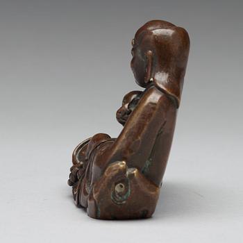 A bronze sculpture of one of the immortals, Qing dynasty, 18/19th Century.