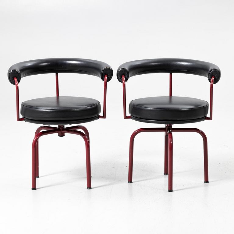 Charlotte Perriand, /Le Corbusier, swivel armchairs, a pair, model LC7, Cassina, Italy, latter half of the 20th century.