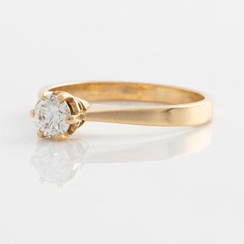 Ring, 18K guld med briljantslipad diamant.