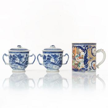 A Chinese porcelain mug and two mugs with covers, Qing dynasty, 18-19th century.
