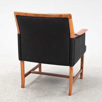 Torbjørn Afdal, a 'Minerva' rosewood desk and a chair, Bruksbo, Haug Snekkeri AS, Norway, 1960's.