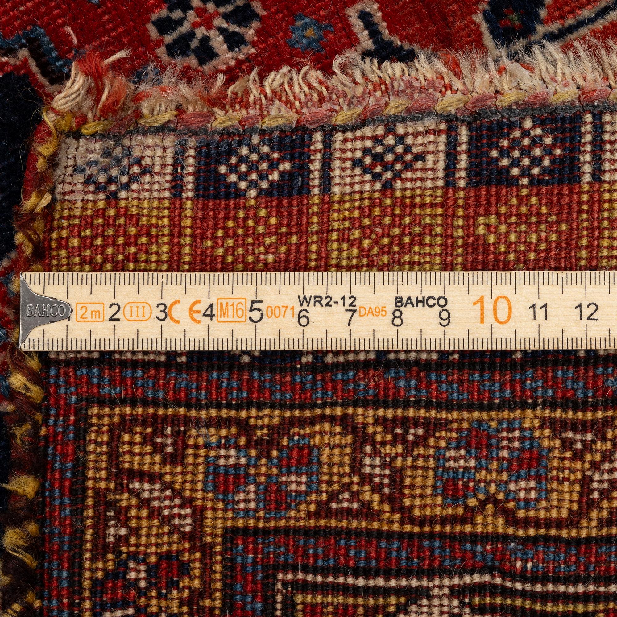 A Kashkuli Qashqai rug, South Persia, c. 246 x 128 cm.