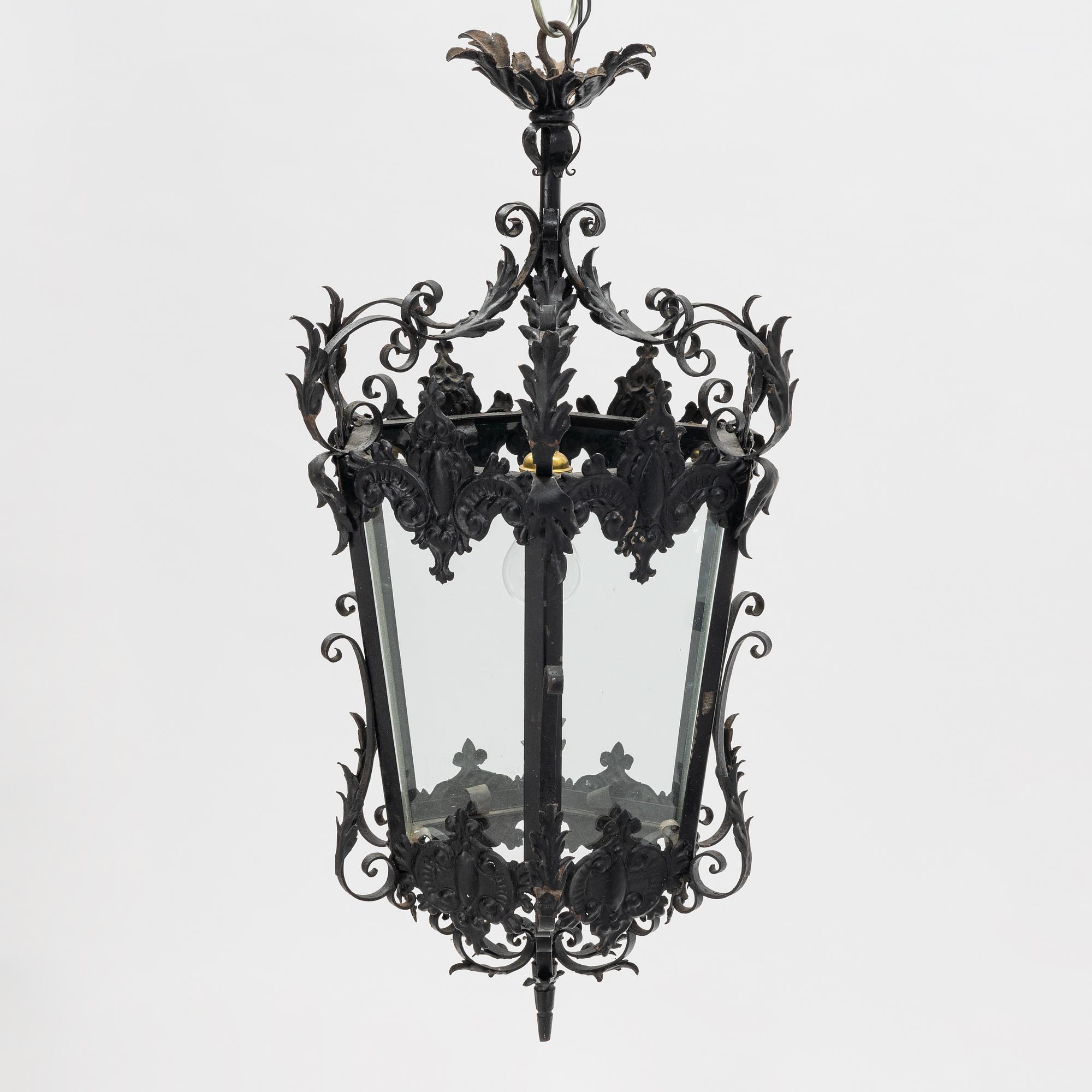 A painted metal lantern, Spain, 20th Century.