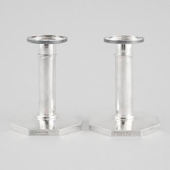 A pair of silver candelsticks by Bengt Liljedahl, STockholm, 1978.