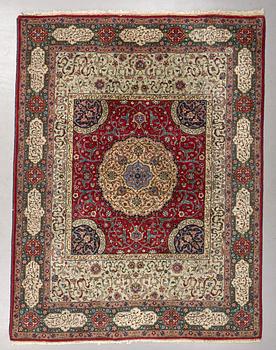 A carpet, semi-antique Tabriz, signed ca 335,5 x 256,5 - 261,5 cm.