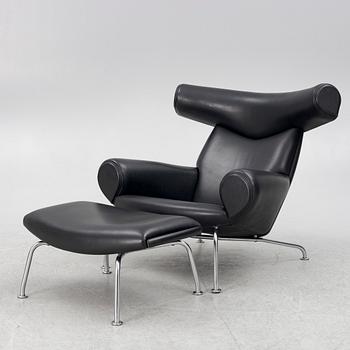 Hans J. Wegner, An 'Ox Chair' with ottoman, EJ-100, Erik Jørgensen Møbelfabrik A/S, Svendborg, Denmark.