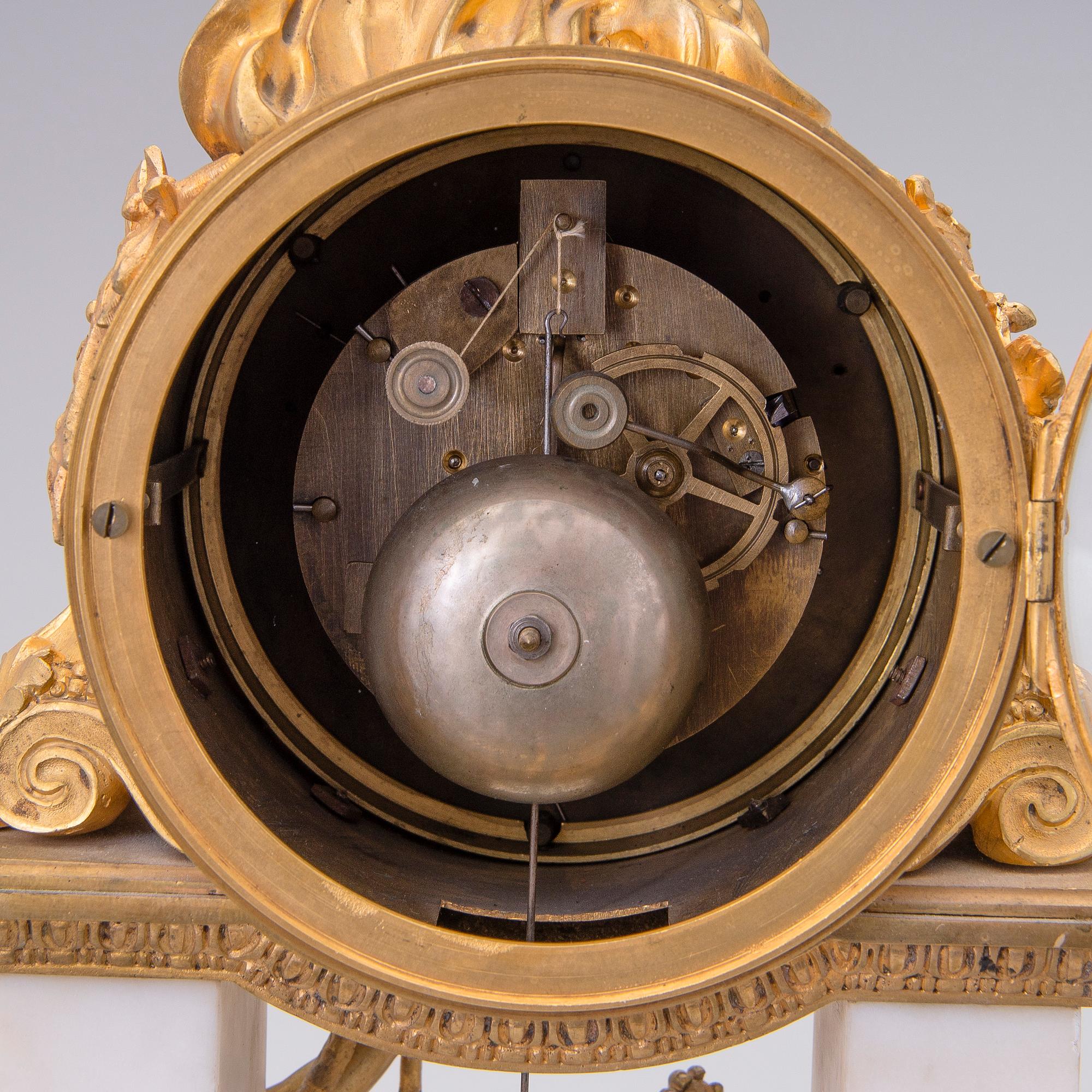 A neoclassical, French mantel clock, ca 1840-1860.
