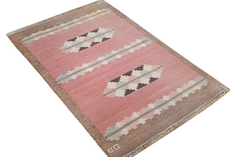 A flat weave carpet, signed GG, c. 190 x 133 cm.