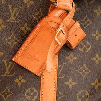 A monogram canvas weekendbag "Keepall 55" by Louis Vuitton.