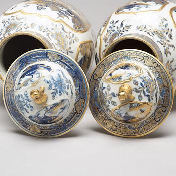 A pair of blue and white vases with covers, Qing dynasty, Qianlong (1736-95).