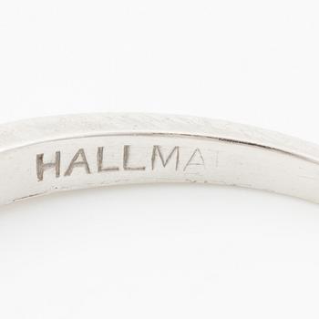 Platinum ring with baguette-cut diamonds.