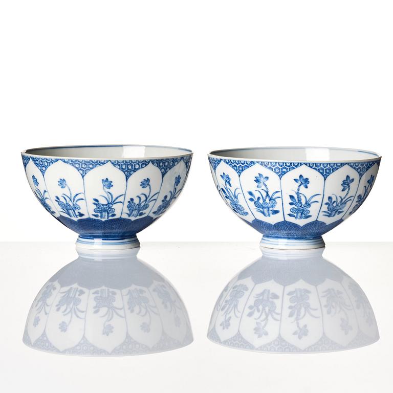 A pair of blue and white bowls, Qing dynasty, with Xuantong mark and of the period (1909-11).