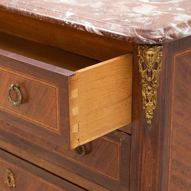 A Louis XVI style chest of drawers, mid 20th Century.