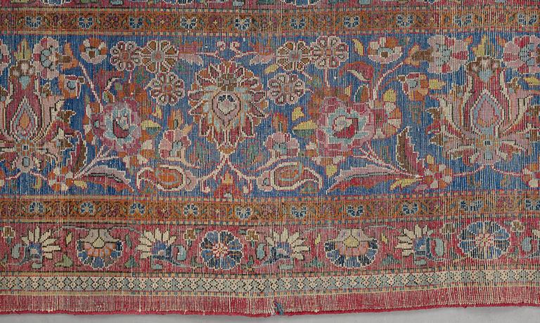 A carpet, a semi-antique silk Kashan, ca 317 x 207-210,5 cm.