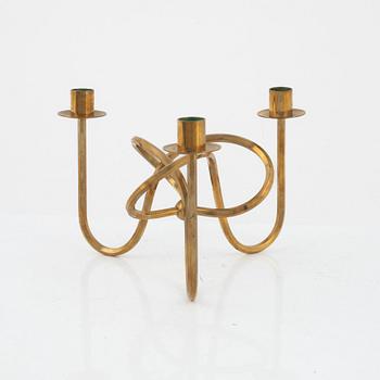 Josef Frank, a brass candelabrum, 'Vänskapsknuten', Firma Svenskt Tenn.