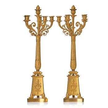 122. A pair of Empire candelabra for six lights.