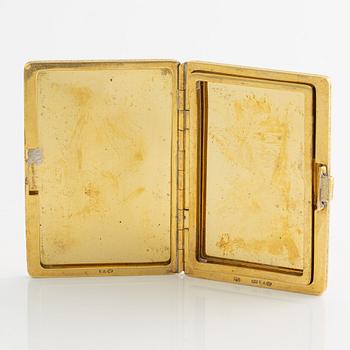 Travel photo album, 18K gold, with monogram.