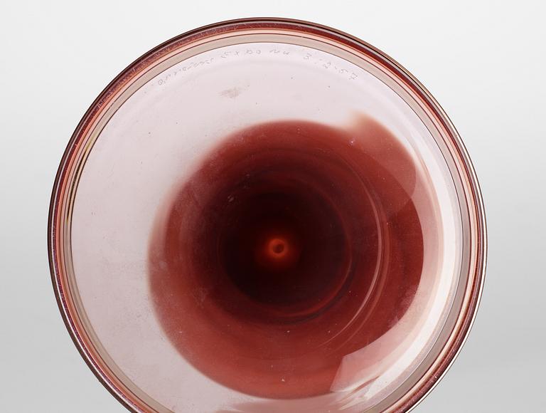 A Nils Landberg red glass goblet, Orrefors.