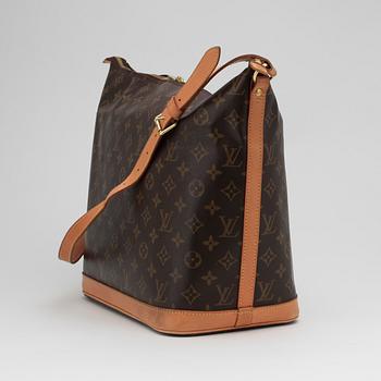 LOUIS VUITTON, a monogram canvas "Limited Edition Sharon Stone Vanity Souple Hobo Bag".