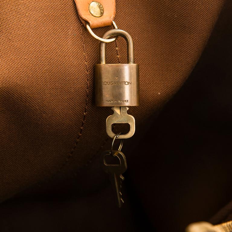 Louis Vuitton, a Monogram Canvas 'Keepall 55 Bandoulière' weekend bag.