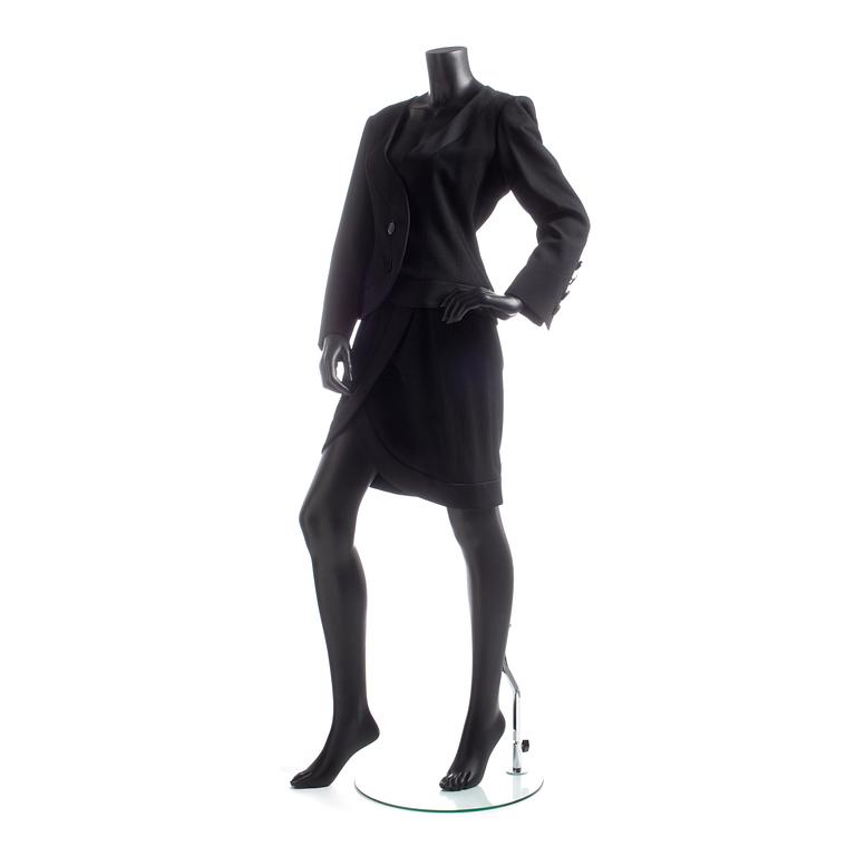 YVES SAINT LAURENT, a black wool dress.