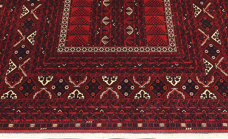 A Afghan carpet, 256 x 168 cm.