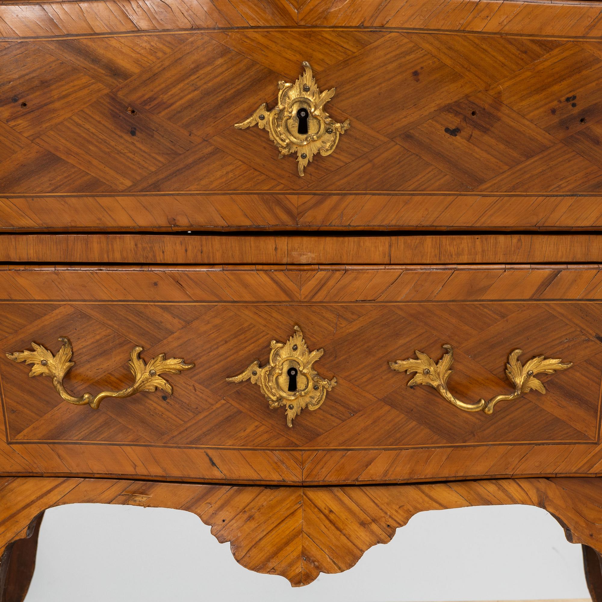 A Rococo chest of drawers by Johan Noraeus (master in Stockholm 1769-1781).