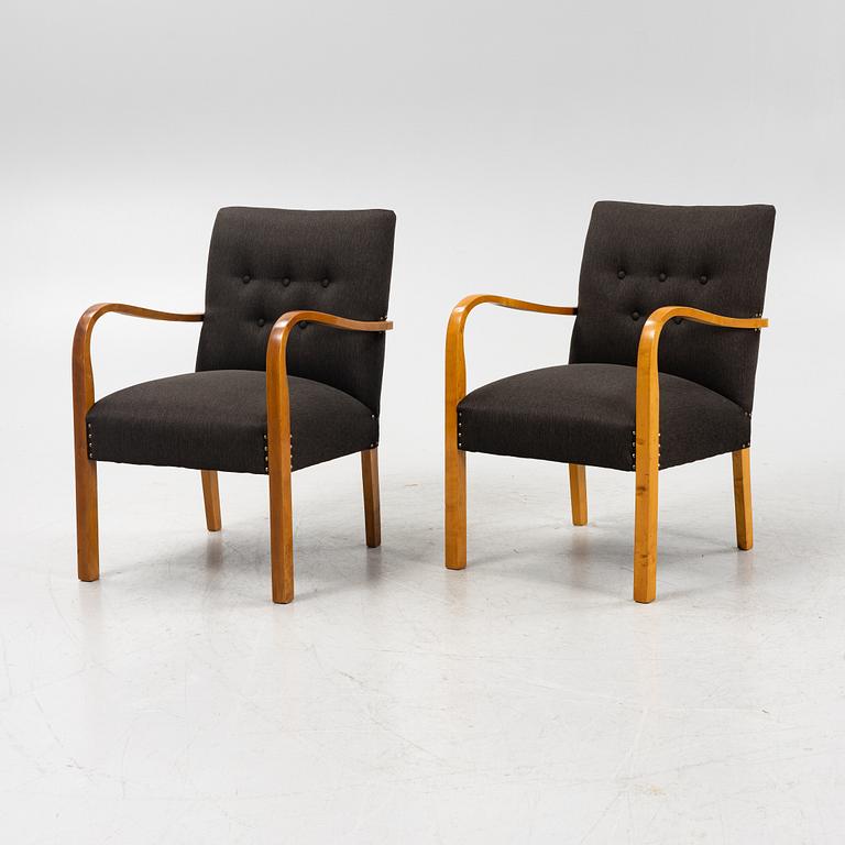 A pair of 1930's/40's armchairs.