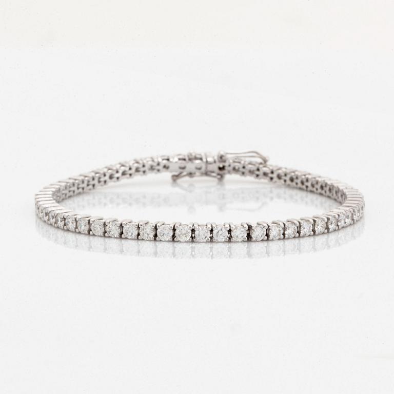 Brilliant-cut diamond tennis bracelet, with report HRD.