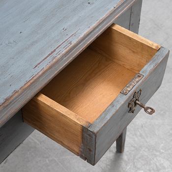 A painted table with a drawer, 19th Century.