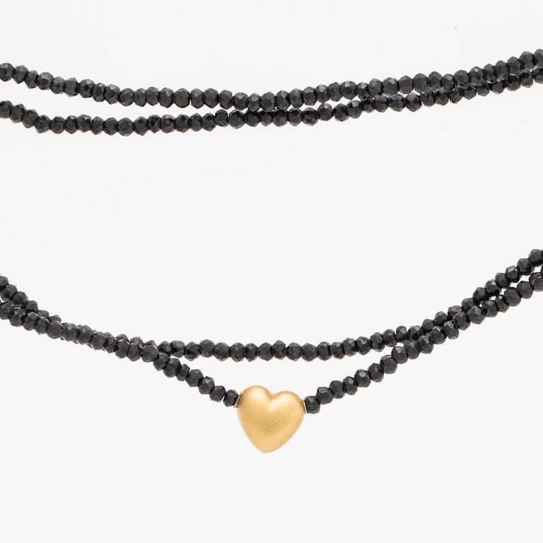 Ole Lynggaard, necklace faceted onyxbeads and clasp 18K gold, dustbag and original case.