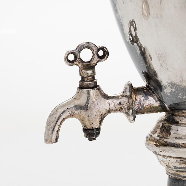 A serving jug with tap, silver plate, first half of the 20th century.