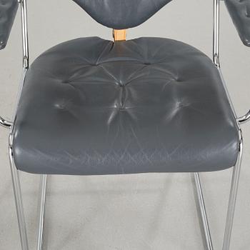 A pair of chairs by Sam Larsson for Dux, designed in 1974.