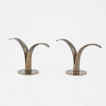 Ivar Ålenius-Björk, pair of bras candle holders, "Liljan", Ystad metall, mid 1900's.