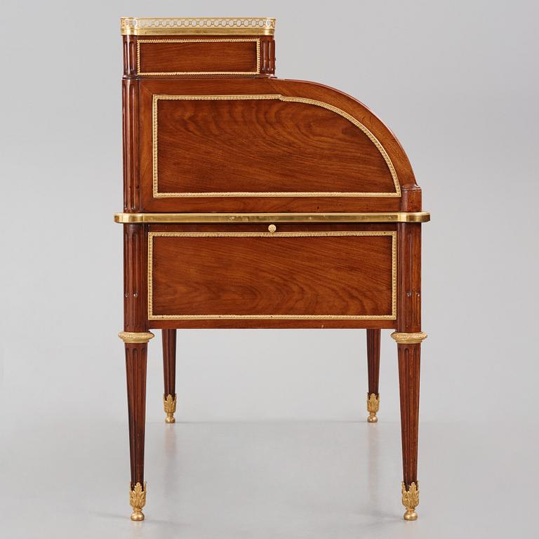A Louis XVI-style mahogany and ormolu mounted 'bureau a cylindre', later part of the 19th century.
