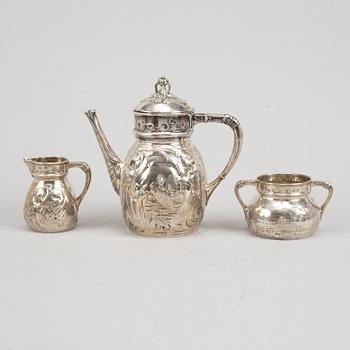 A Swedish silver coffee pot, creamer and sugar bowl, mark of Emil Oscar Möller, Malmö 1907.