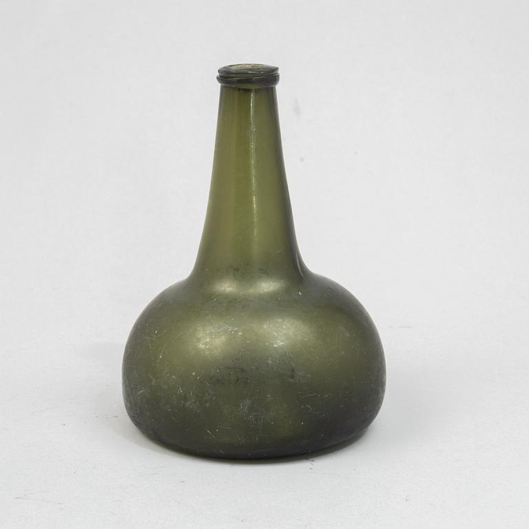 A glass bottle, 18th century.