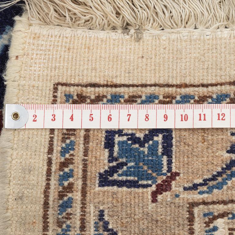 A Nain carpet, c. 295 x 190 cm.