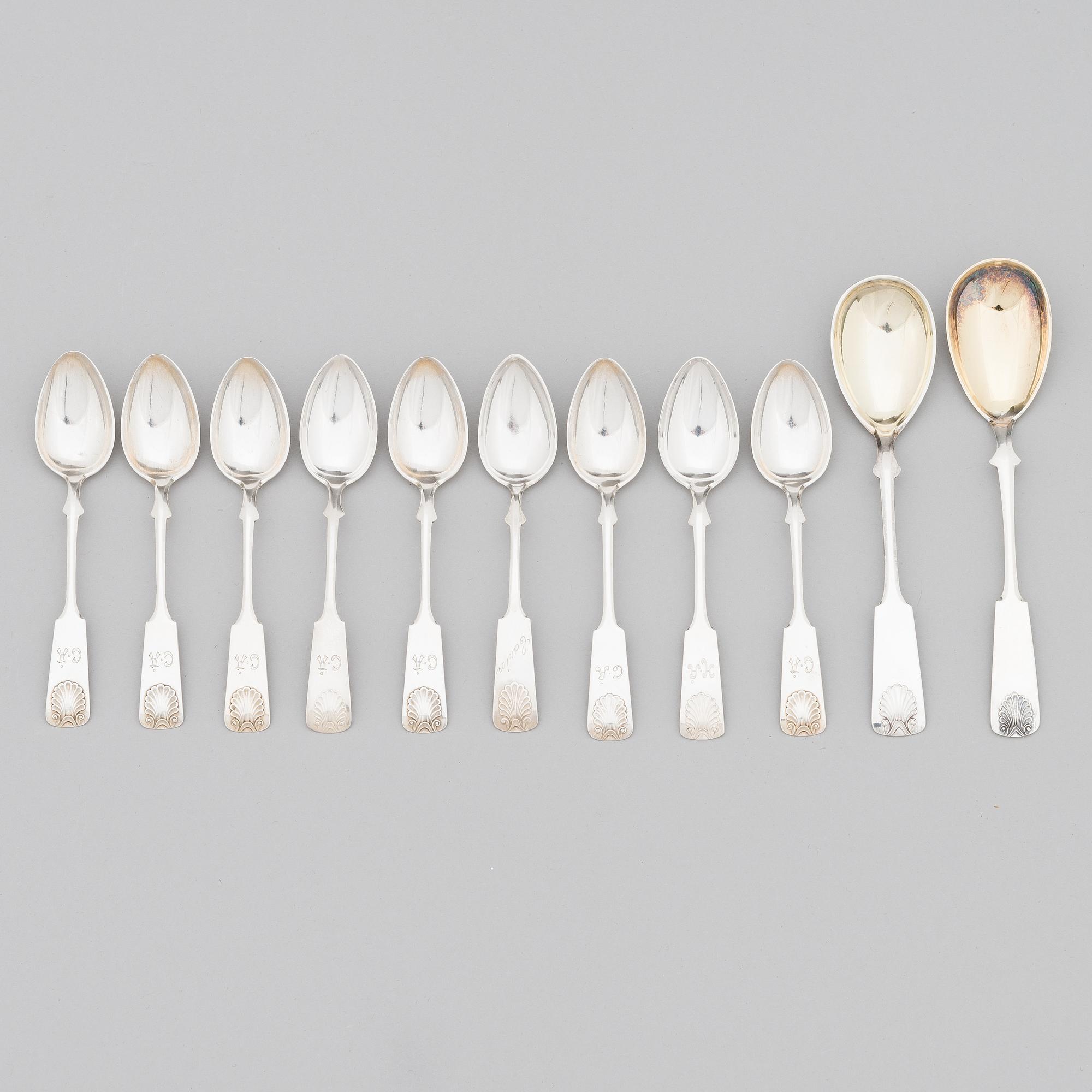 A 42-piece set of silver cutlery with seashell decorated handles, Finnish hallmarks, 1918-1950.