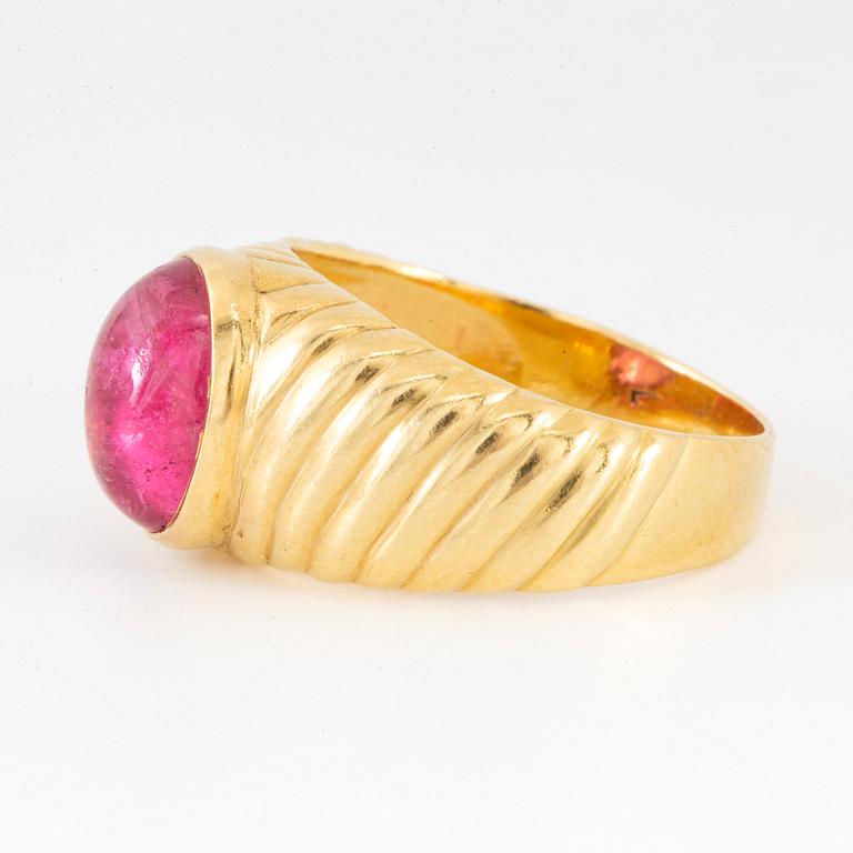 Cabochon-cut pink tourmaline ring.