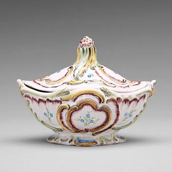 257. A Swedish Rörstrand faience tureen with cover, dated 9/2 1773.