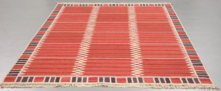 Barbro Nilsson, A CARPET, "Salerno kallröd med enkel bård", flat weave, ca 217 x 149,5 cm, signed AB MMF BN.