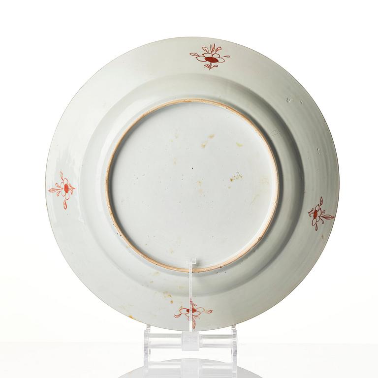 A large iron red and famille verte charger, Qing dynasty, early 18th century.