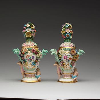 A pair of Meissen pot-purri jars with covers, 19th Century.