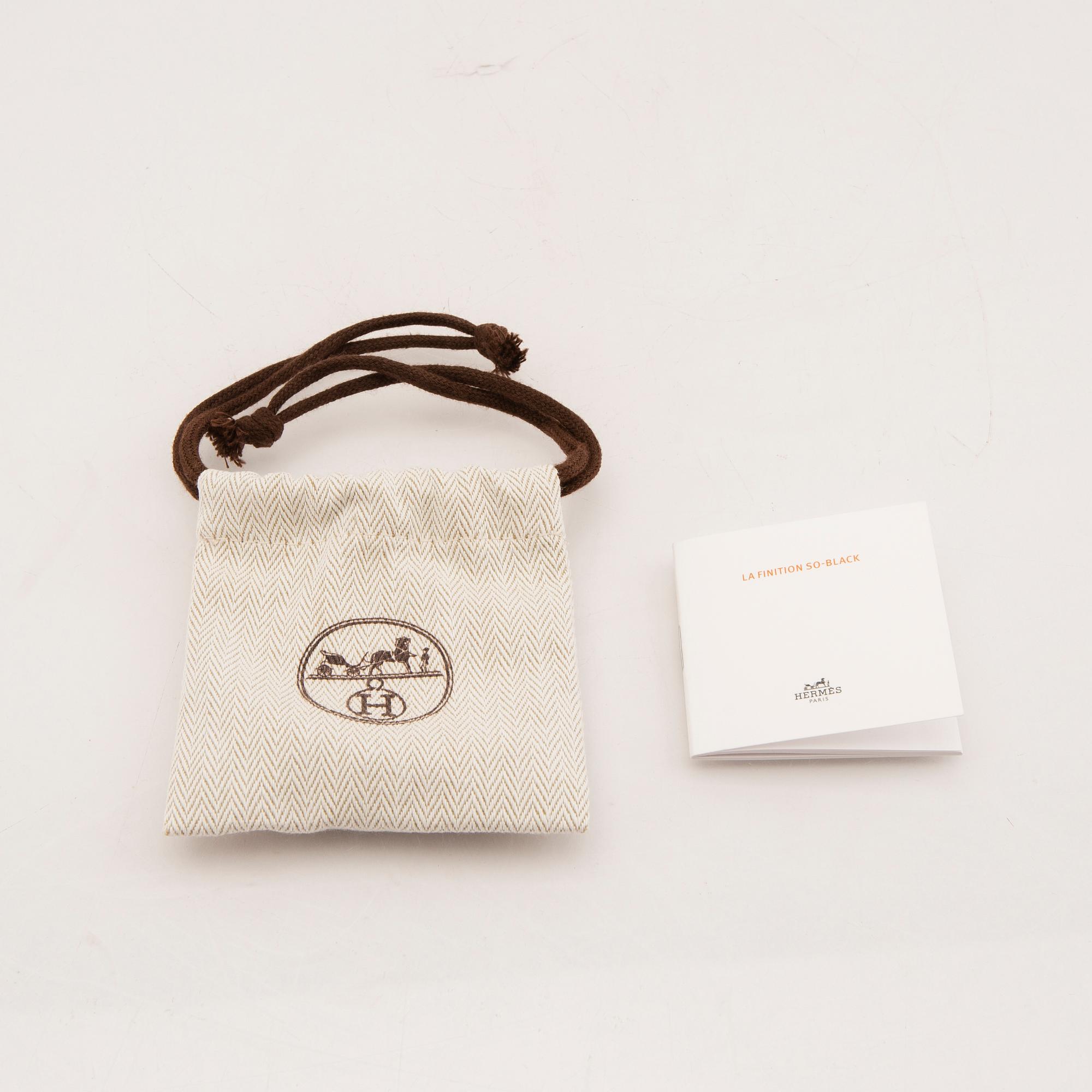 Hermès, armband "Tournis Tresse Bracelet".