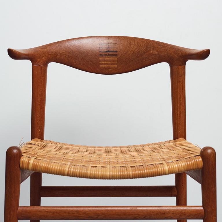 Hans J. Wegner, a set of six teak and rattan "Cowhorn Chairs" "JH-505", executed by cabinetmaker Johannes Hansen, Denmark 1950-60's.