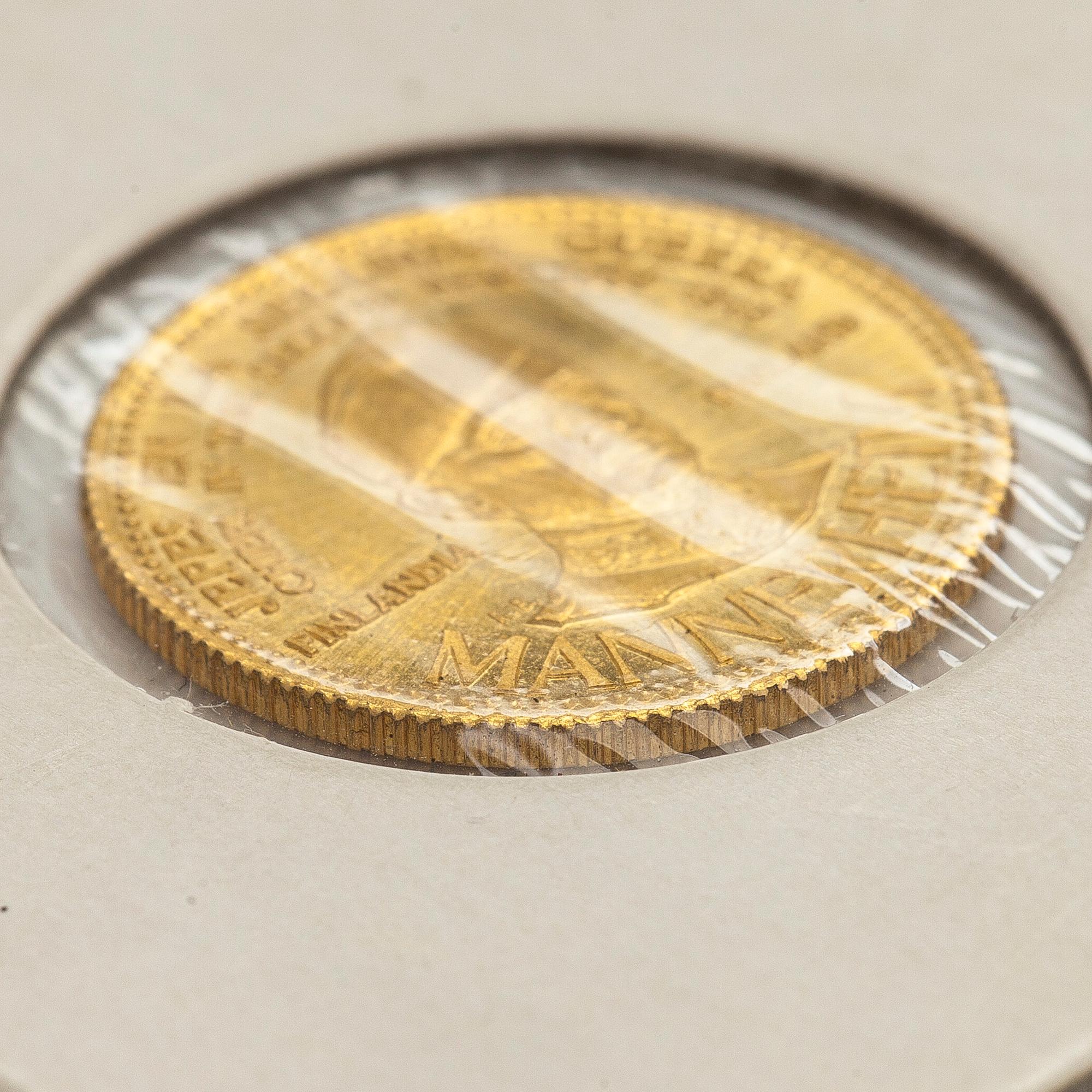 A commemorative coin of Mannerheim, gold, Venezuela 1958. Banco Italo-Venezuela.
