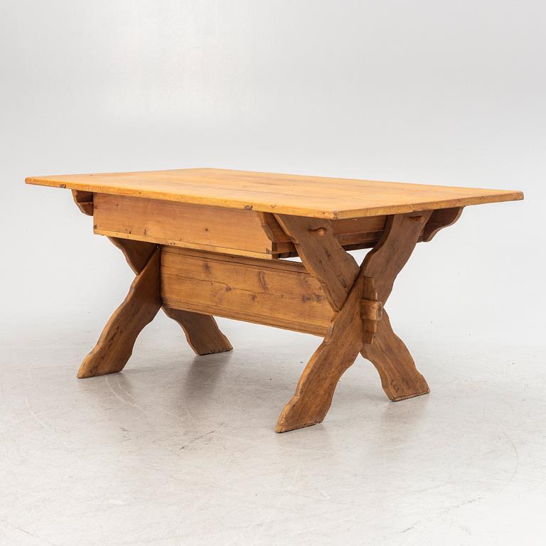 A pine table, 19th Century.