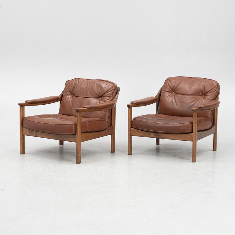 A pair of 1970's armchairs.